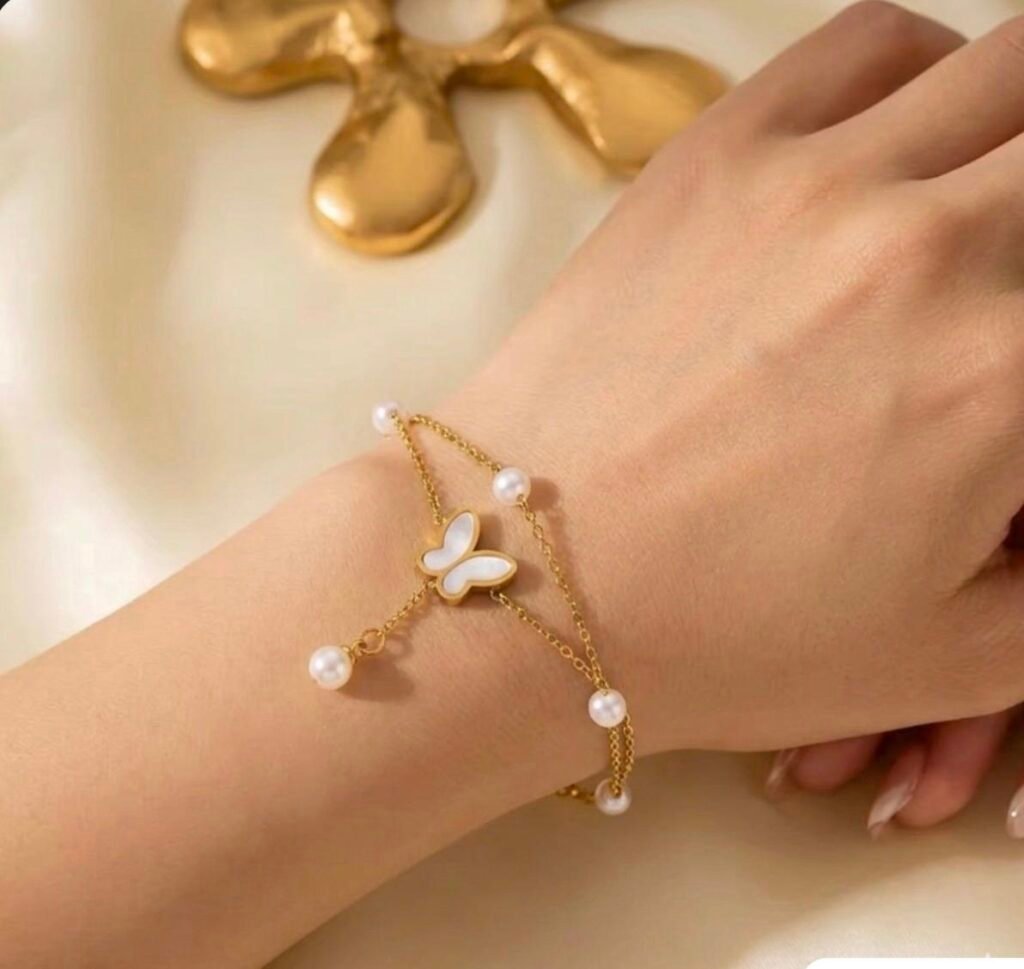 Butterfly and pearl chain bracelet
